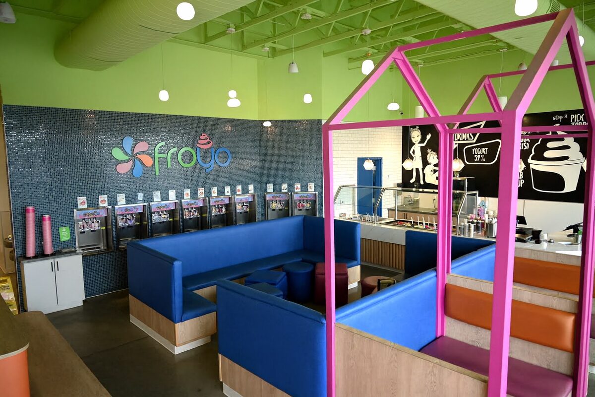 Saratoga Springs yogurt wall with blue booths